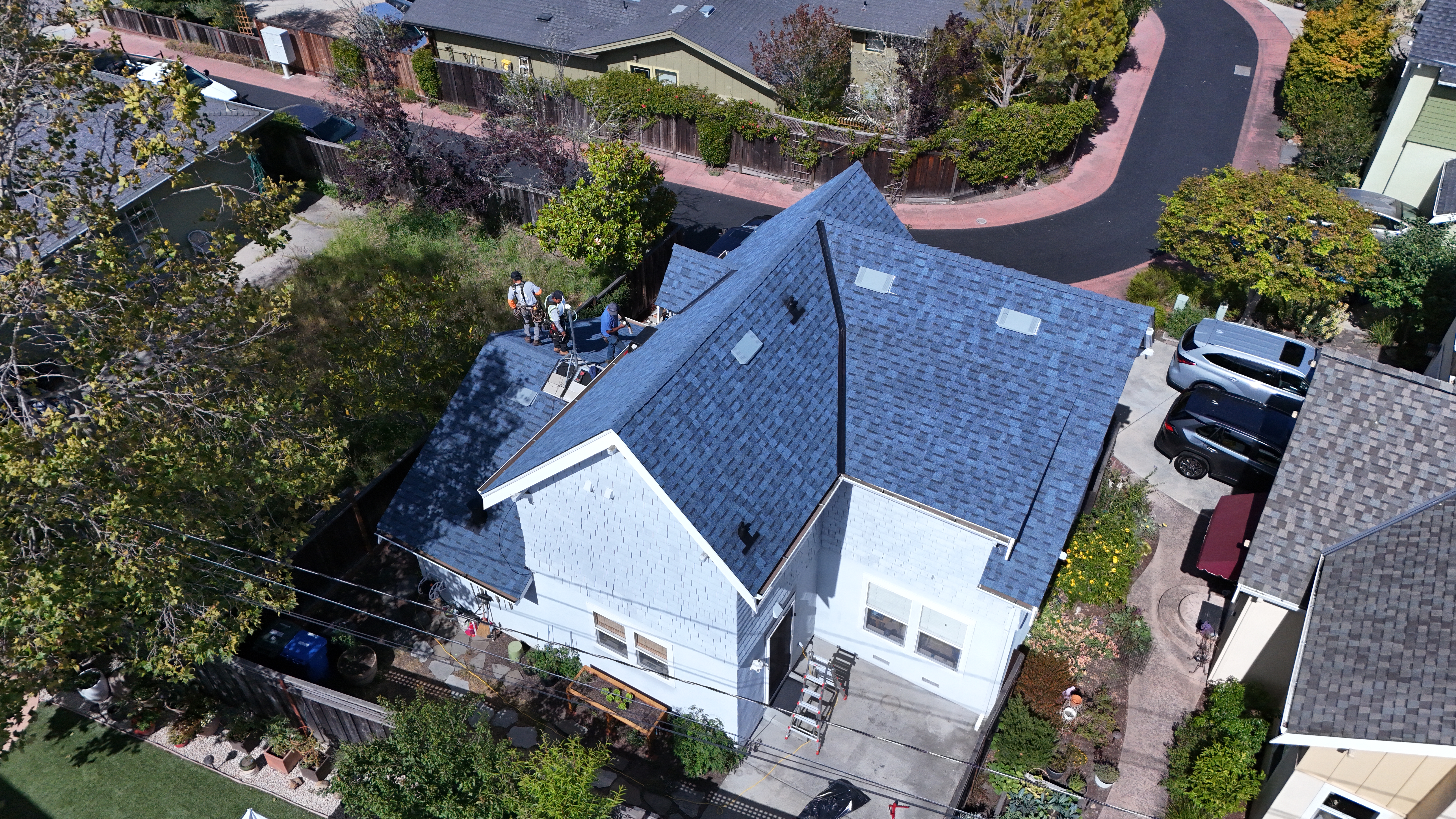 Harbor Blue Duration shingles on craftsman home – aerial side view